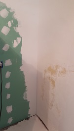 The New Drywall Installed And First Coated And Corner Feathered